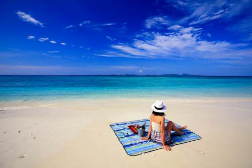Relax on the beach with a bottle of wine, Yeben Island, Raja Ampat