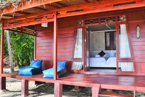 Blue sofa to relax under the porch of Cove Eco Resort Villa, Yeben Island, Raja Ampat